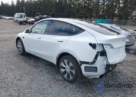 2023 Tesla Model Y Awd/Long Range Dual Motor All-Wheel Drive z USA, uszkodzony, nr VIN 7SAYGDEE7PF682772